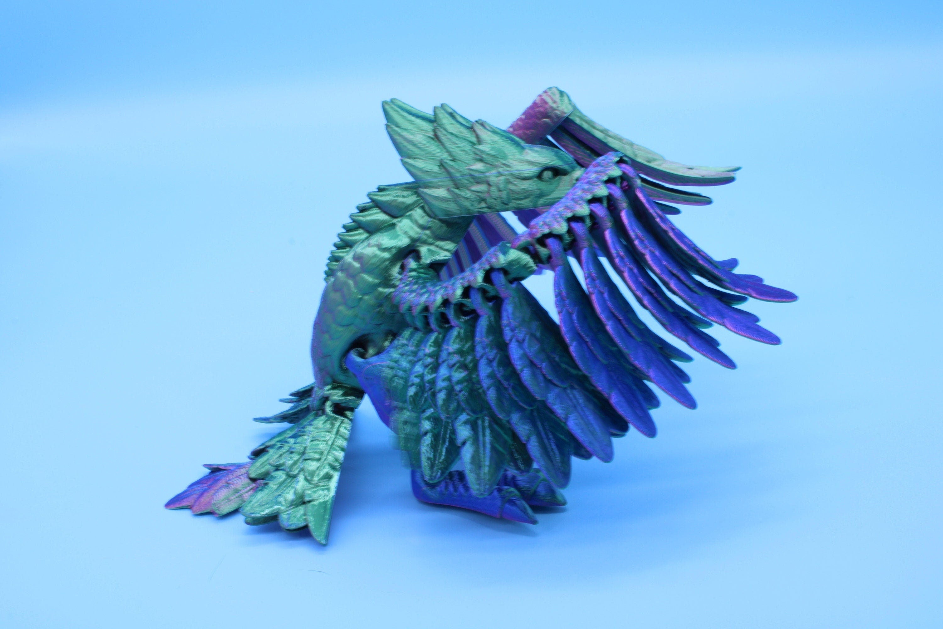 Cute Flexi Multi Color Phoenix. Unique 3D printed. Great Articulating fidget toy, desk, sensory toy. 4 inch Blue, Red, Teal, Green.