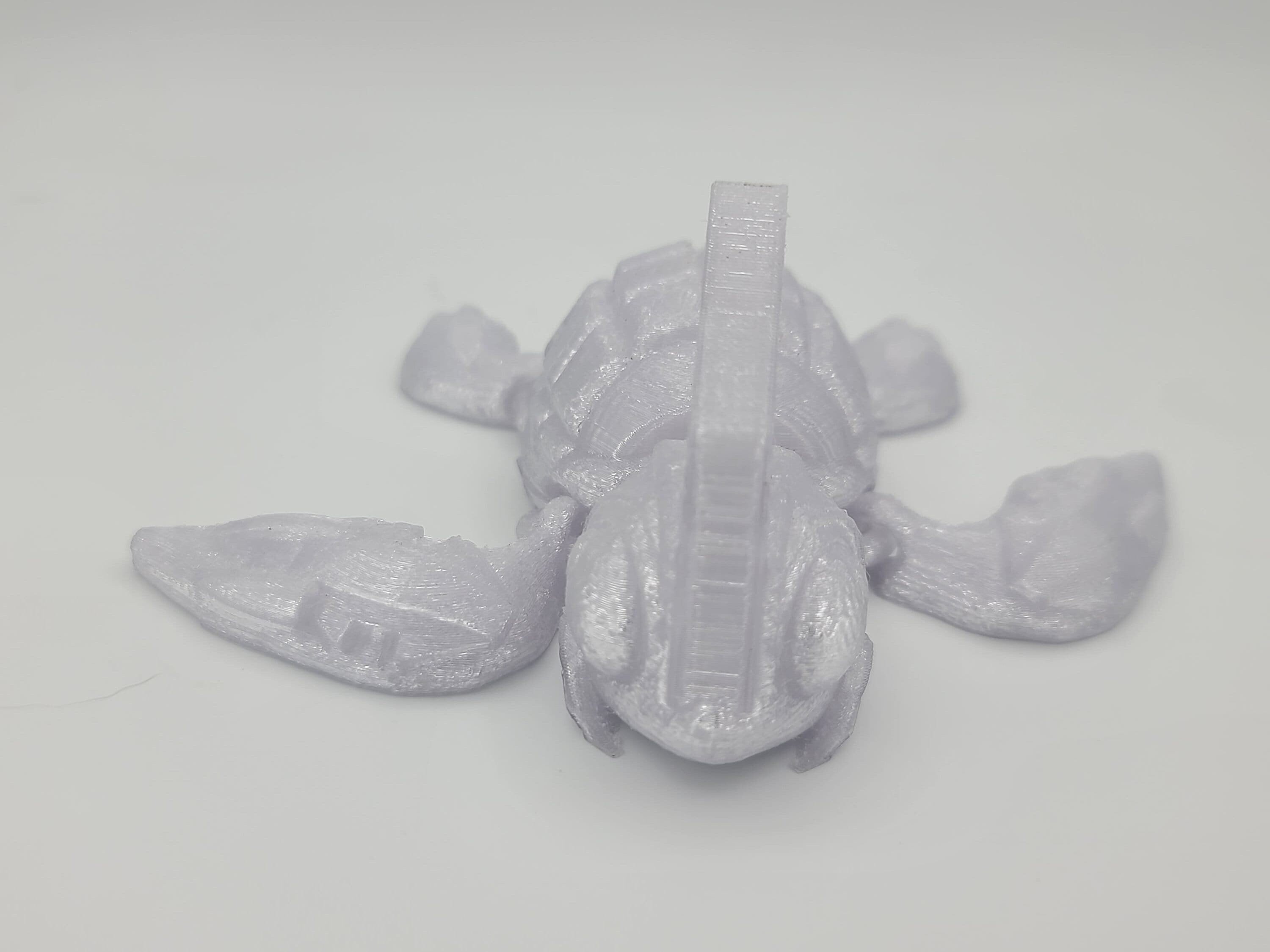 Silver shimmer turtle articulating (Grenurtle) link head. 3D printed. Flexi fidget turtle, (made) adult desk fidget toy. perfect gift