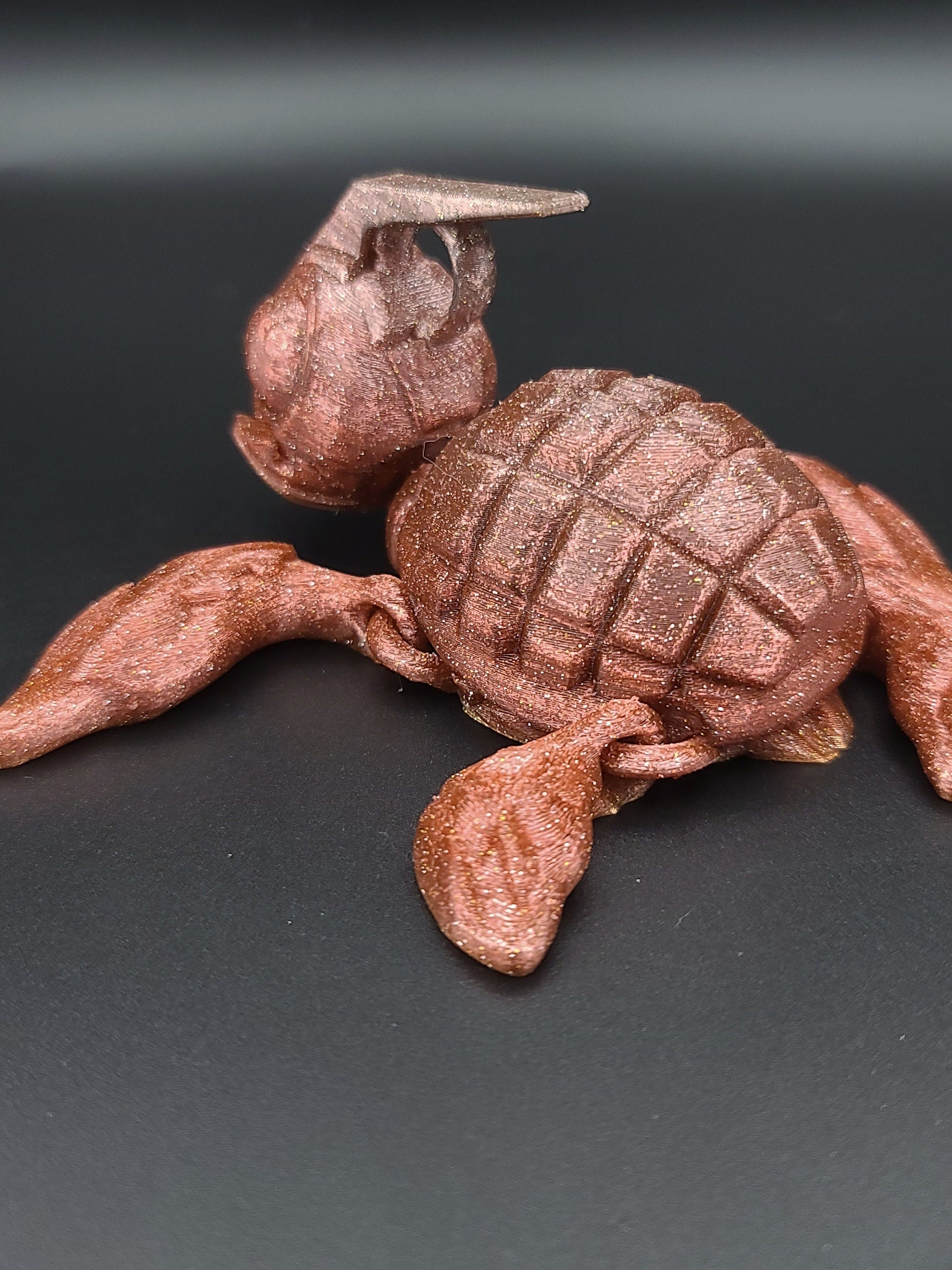 Dark red grenurtle grenade / turtle 3d printed small color change (golden bottom to red / maroon) (made) adult desk fidget toy.