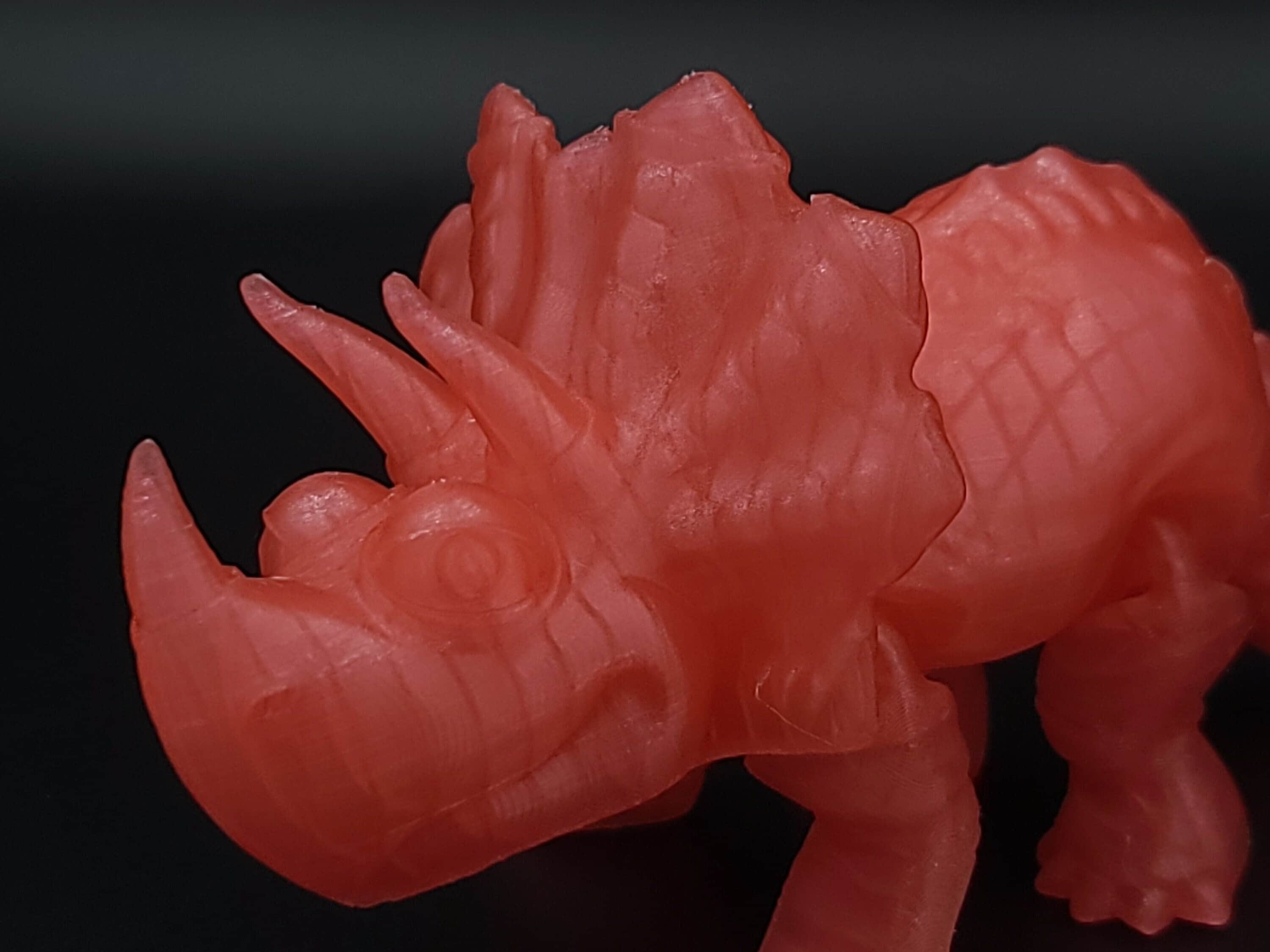 Cute Flexi Watermelon Red Translucent Triceratops. Unique 3D printed Triceratops. Great Articulating fidget toy, desk, sensory toy. 6.5 inch