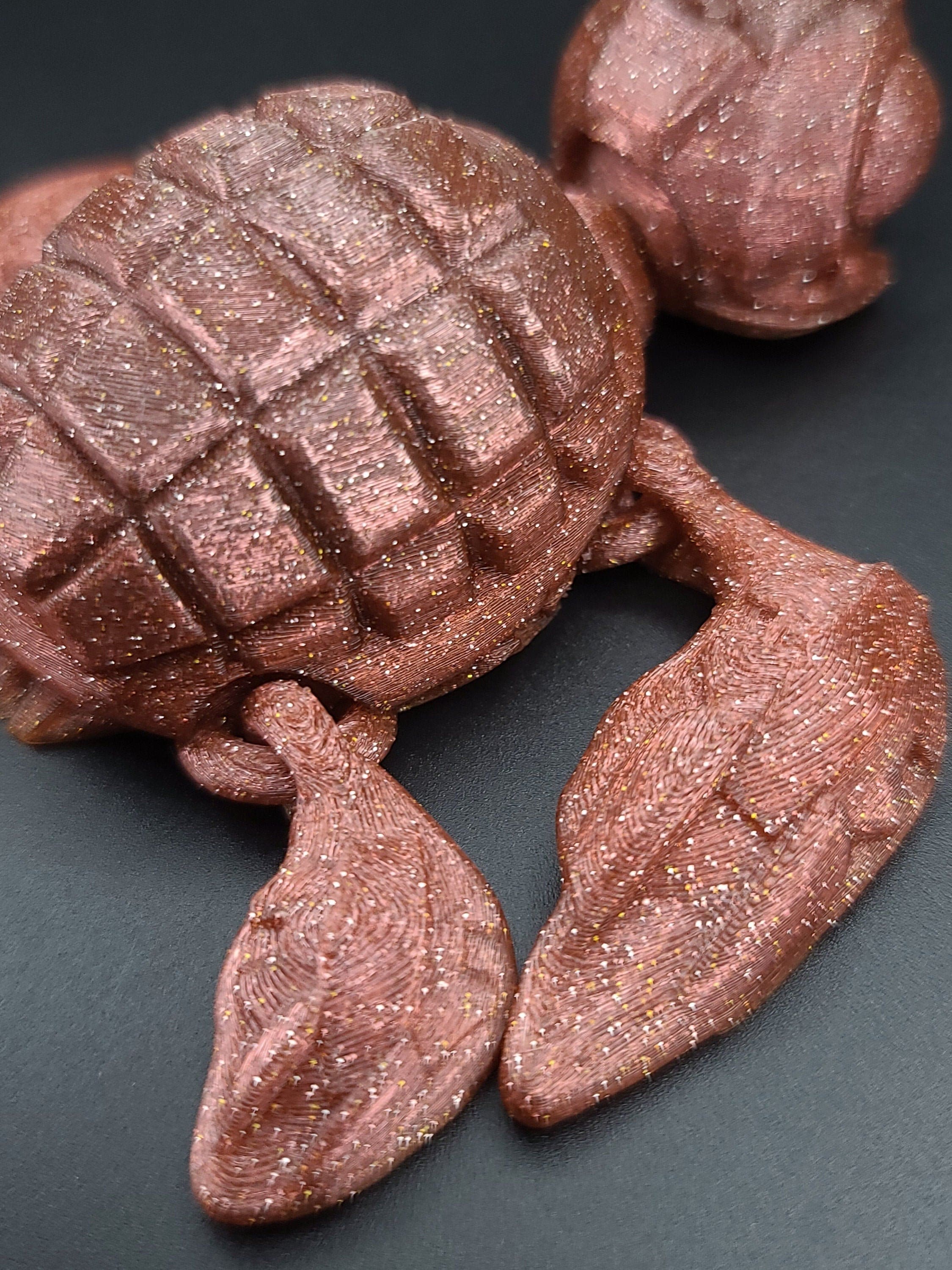 Dark red grenurtle grenade / turtle 3d printed small color change (golden bottom to red / maroon) (made) adult desk fidget toy.