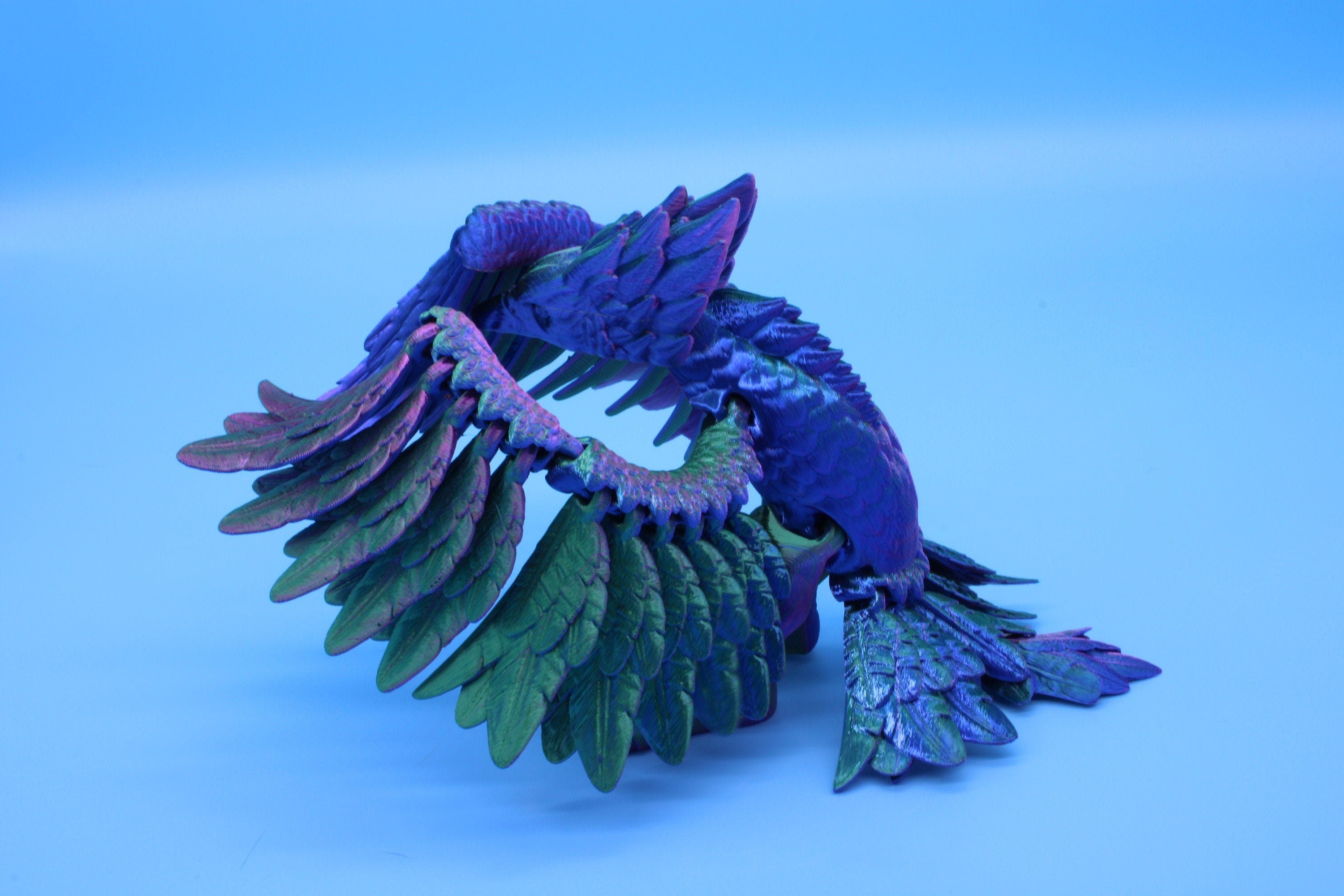 Cute Flexi Multi Color Phoenix. Unique 3D printed. Great Articulating fidget toy, desk, sensory toy. 4 inch Blue, Red, Teal, Green.
