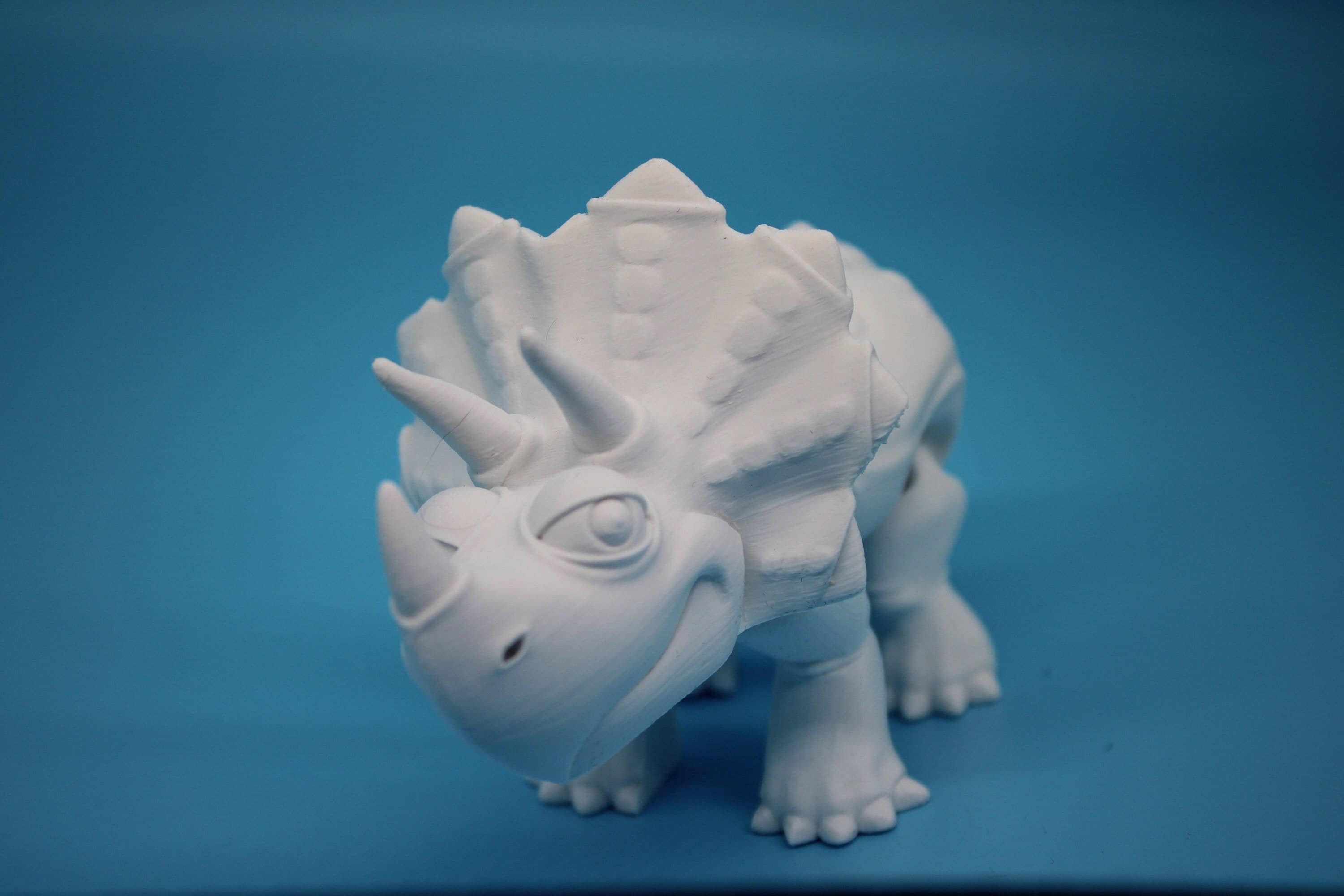 Cute Flexi White Triceratops. Unique 3D printed Triceratops. Great Articulating fidget toy, desk, sensory toy. 6.5 inch