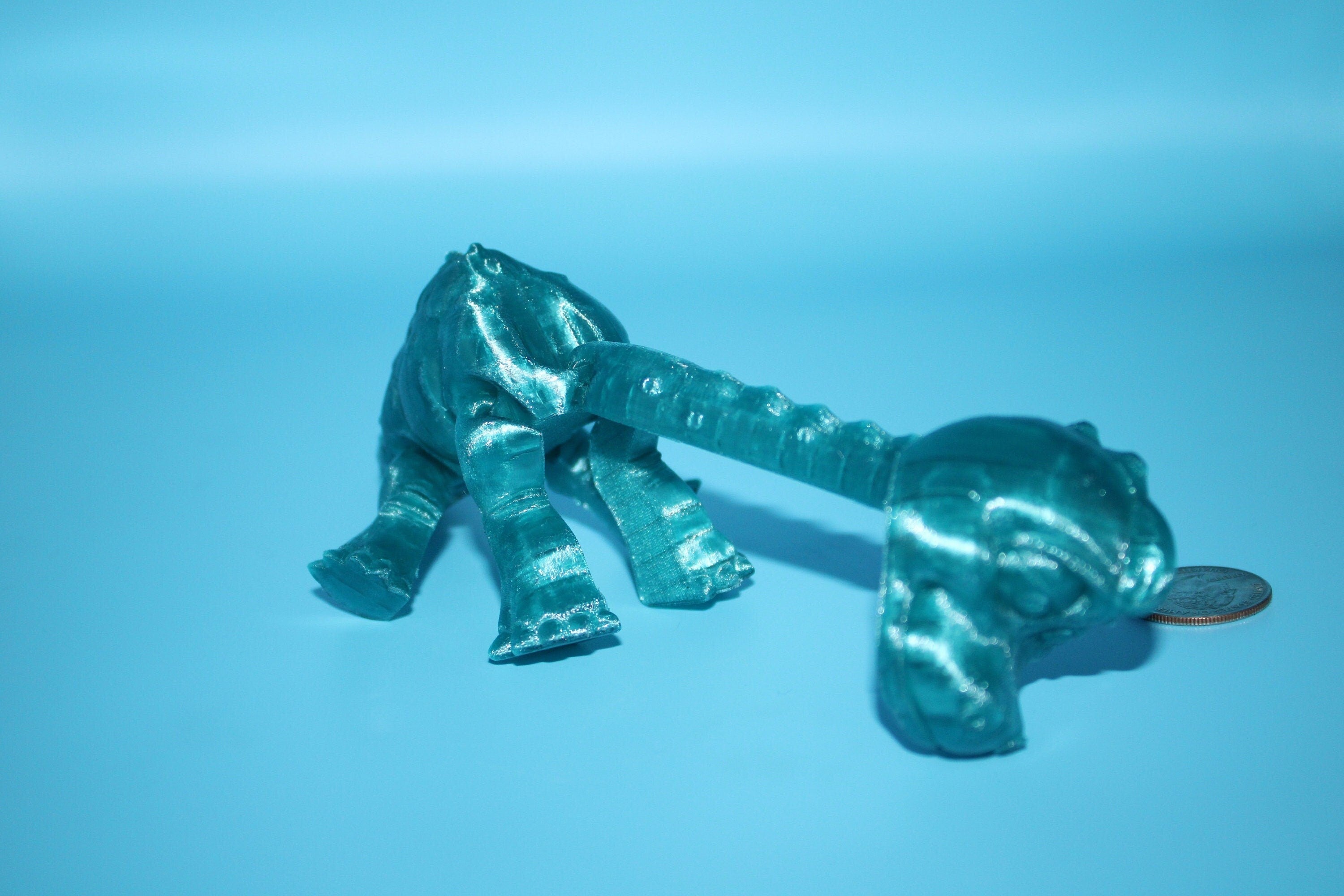 Teal Translucent Brachiosaurus. Cute Flexi Articulating Dinosaur. 3D printed unique dino. Great fidget toy, buddy, desk art / toy. 9 in.