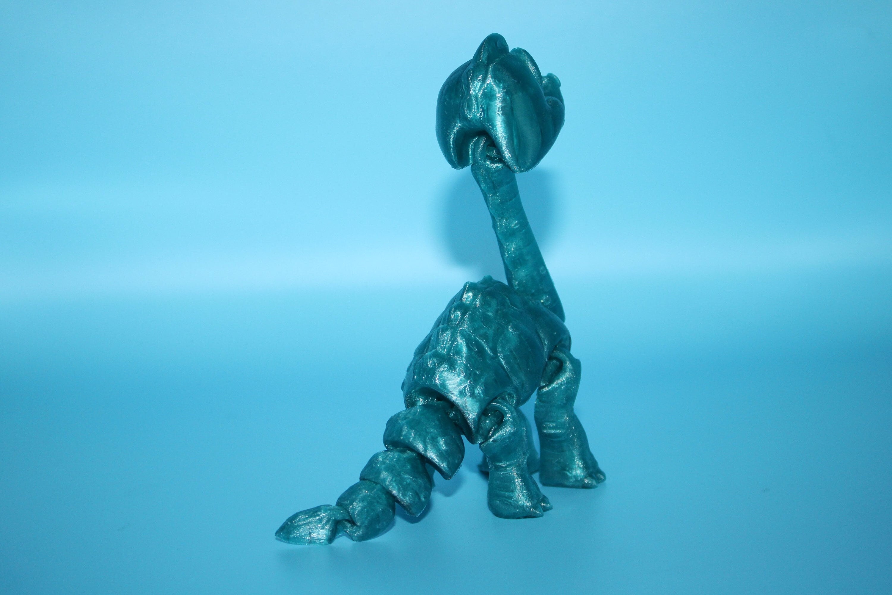 Teal Translucent Brachiosaurus. Cute Flexi Articulating Dinosaur. 3D printed unique dino. Great fidget toy, buddy, desk art / toy. 9 in.