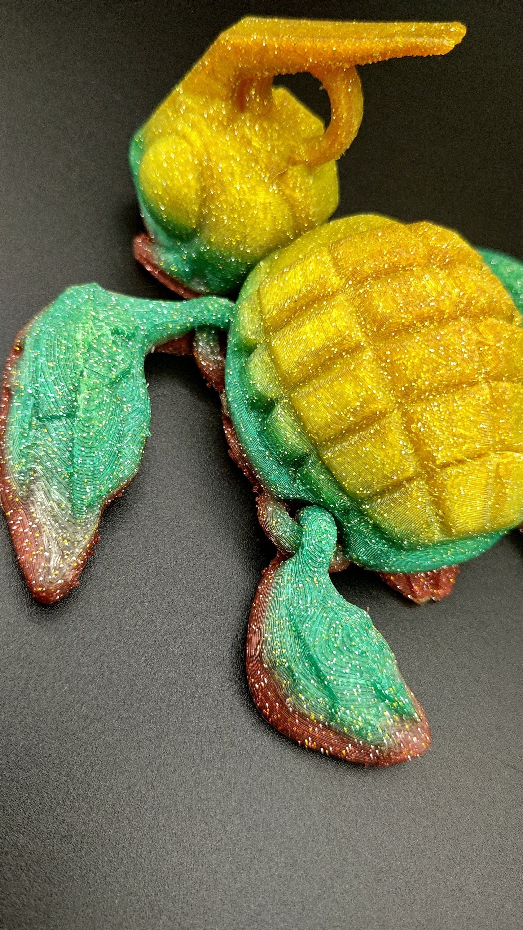 Sparkle Rainbow, (Red, Green, Yellow Gold,) Grenurtle, grenade / turtle 3d printed (made) adult desk fidget toy. Sensory turtle buddy.
